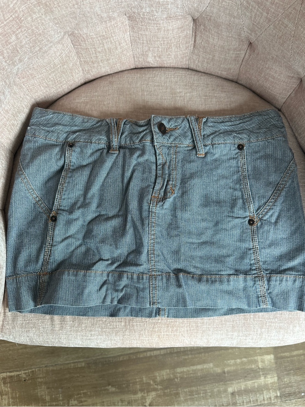 Light Blue Denim Mini Skirt with Front Pockets